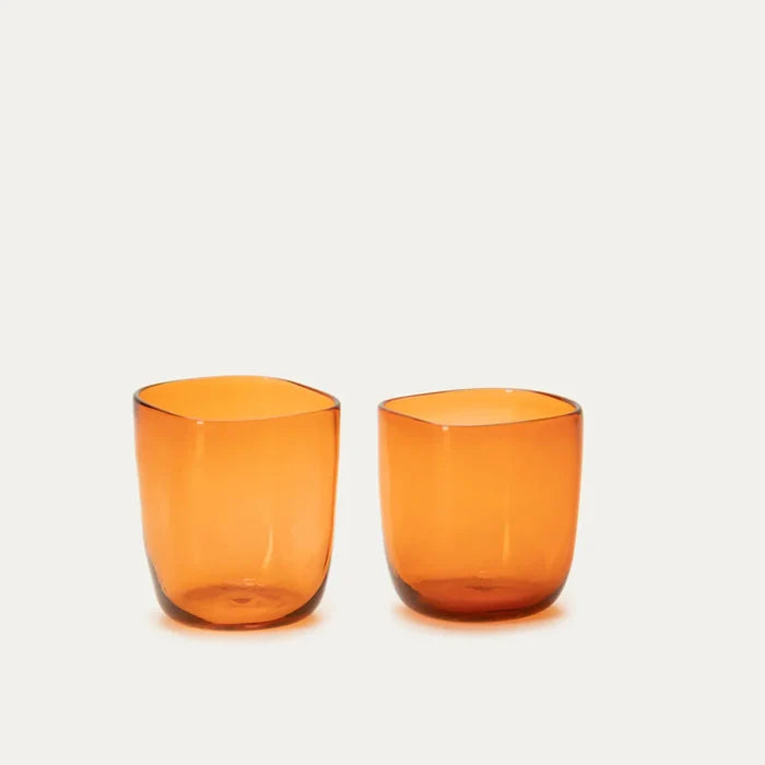 Two handcrafted, mouthblown glass cups.