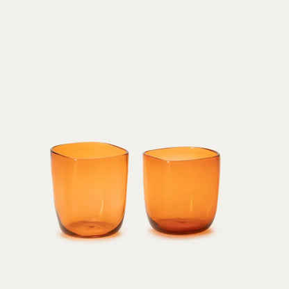 Two handcrafted, mouthblown glass cups.