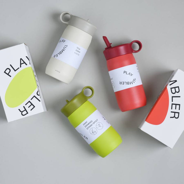 Assortment of PLAY TUMBLERS in various colors displayed next to their packaging.