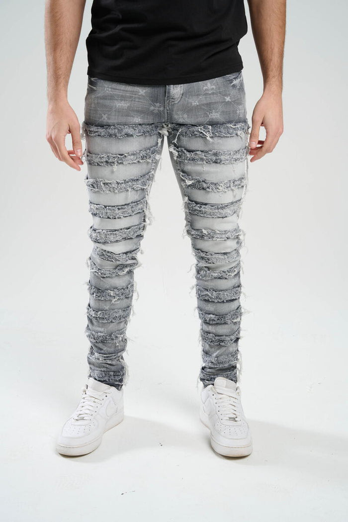 TAKER-PREMIUM STRETCH SLIM FIT JEANS WITH DISCHARGE PRINT & FRAYED PATCH